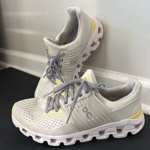 On Running Cloud Shoes in Cream and Yellow